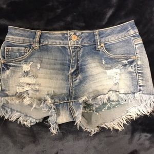Distressed denim shorts